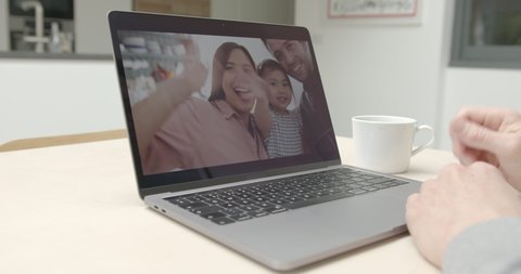 Family Using video call at home to connect with family at home in kitchen