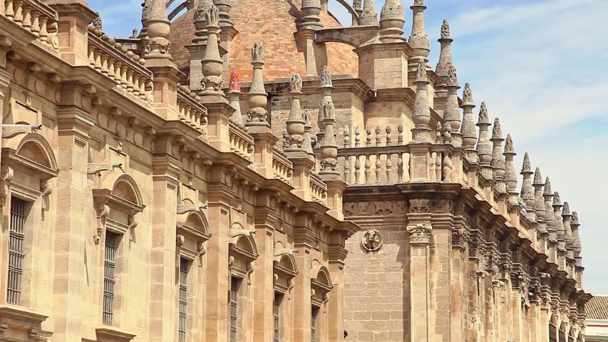 close up view of Roman Catholic and largest Gothic church. Seville Cathedral is Heritage Site. Cathedral of Saint Mary of the See is one of sightseeing tourist attractions of Andalusia, Spain.