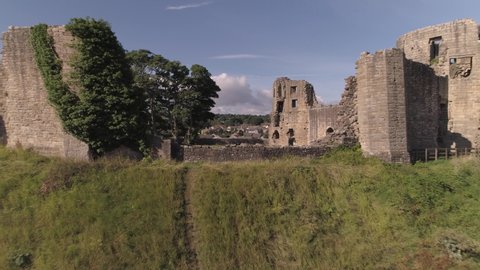 Barnard Castle in Teesdale, County Durham. Aerial shot in a zoom, dolly style, across the ruins from the North East wall to the South West wall