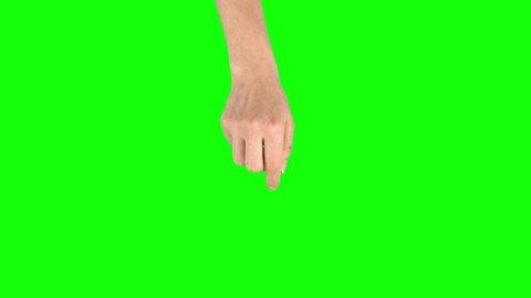 Female hand is performing Swipe Up at tablet screen gesture on green screen. Close up