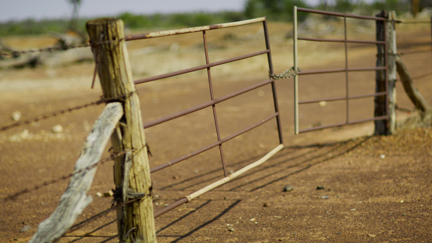 Barbed wire fence and cattle gate in Outback Australia