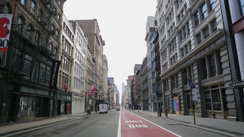 New York, NY/ USA - April 6 2020: Empty Broadway in SoHo due to Coronavirus COVID-19 outbreak in New York and stay at home and social distancing policy
