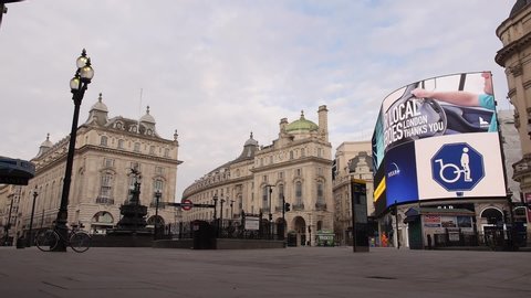 London, England / United Kingdom - April 8 2020: Video of Picadilly Circus empty due to coronavirus outbreak 