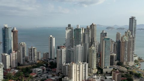 Aerial view of Panama city panorama in Panama. Modern city with skyscrapers and bay area. Drone 4K moving slowly forward.