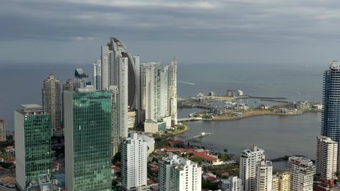 Aerial view of Panama city panorama in Panama. Modern city with skyscrapers and bay area. Drone 4K moving forward.