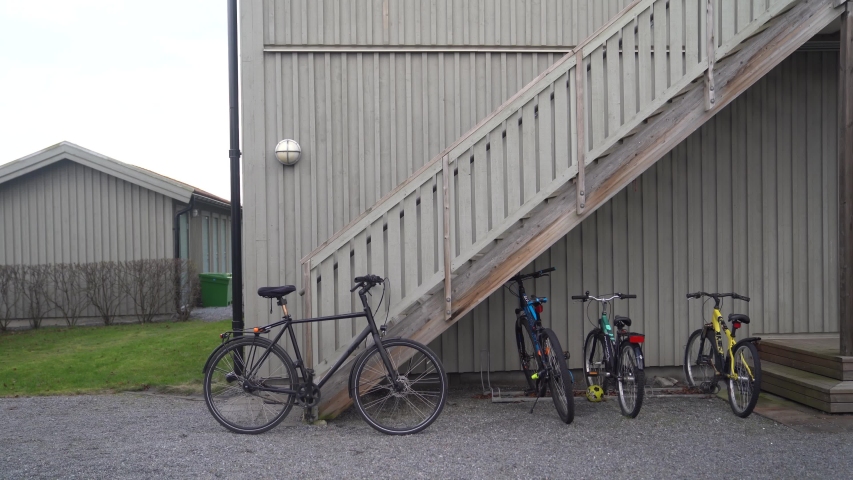 Bikes placed near house in Sweden
