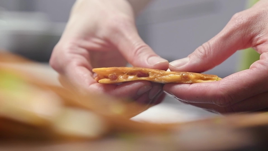 Quesadillas with chorizo and cheese.Slow motion. Royalty-Free Stock Footage #1050047278