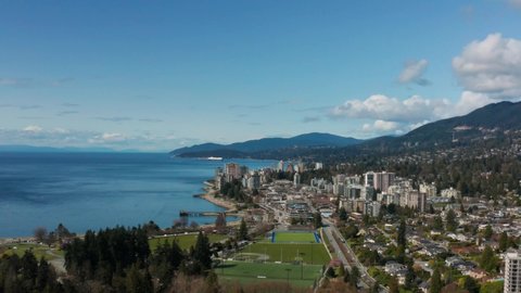 Beautiful aerial view over the Marine Drive and Ambleside West Vancouver to the Pacific Ocean