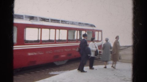 COLORADO SPRINGS-1967: A Group Of Family Persons Are Moving Around The Place To See Around