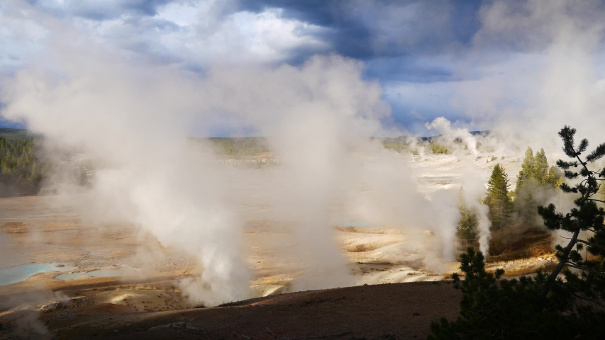 Steam rising from the geysers and hot springs of Yellowstone National Park