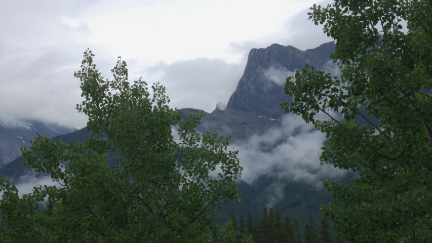 Timelapse of Mt Lawrence Grassi in Canmore, Alberta with clouds rolling in and out