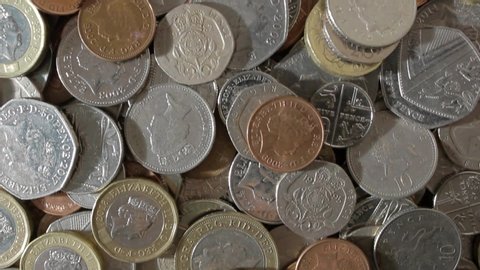 UK currency bank notes and coins. Filmed East Yorkshire, England. 07/04/2020
