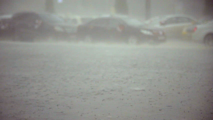 heavy rain and hail hit the city in the afternoon / Slow motion shot at 60 fps. You can  increase the speed to make 24 or 30 fps if you want