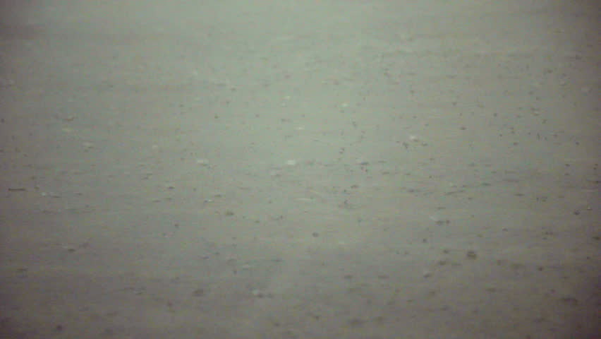 heavy rain and hail hit the city in the afternoon / Slow motion shot at 60 fps. You can  increase the speed to make 24 or 30 fps if you want