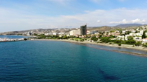 Drone Shot Descending Over the Water and Rocks at the Marina in Limassol, Cyprus