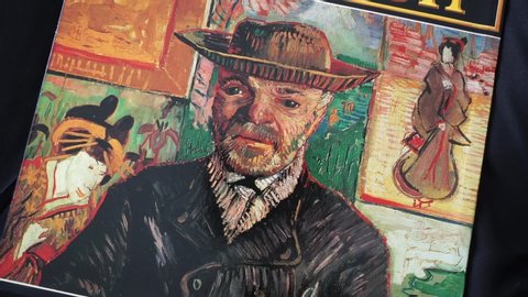Rome, Italy - April, 05 2020, image by Vincent Van Gogh, detail from the Self-portrait of 1890, Paris, Musée d'Orsay, on the cover of a book dedicated to a biography of the artist.