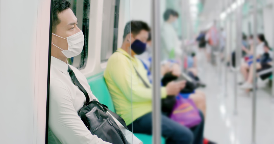 asian businessman on subway with face mask while covid-19 serious Royalty-Free Stock Footage #1050198547