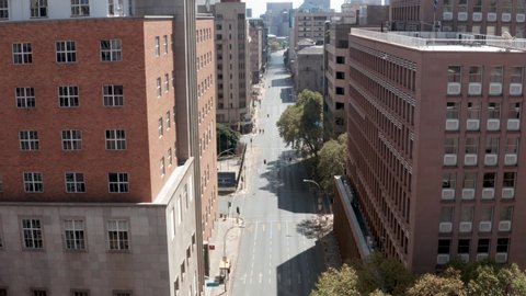 An aerial view of an empty street lined by tall buildings in Johannesburg city centre, during the covid-19 coronavirus lockdown. 