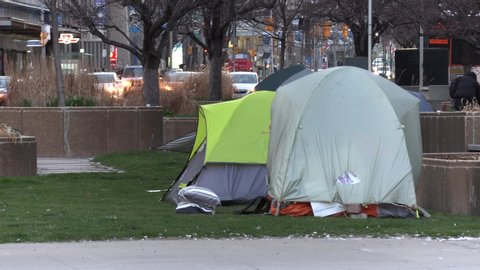 Toronto, Ontario, Canada April 2020 Homeless people sleep in tents on street during COVID 19 coronavirus pandemic