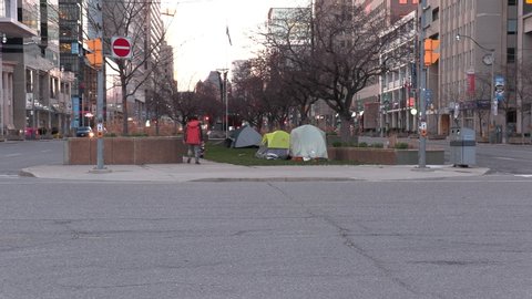 Toronto, Ontario, Canada April 2020 Homeless people sleep in tents on street during COVID 19 coronavirus pandemic
