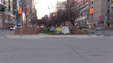 Toronto, Ontario, Canada April 2020 Homeless people sleep in tents on street during COVID 19 coronavirus pandemic in Toronto