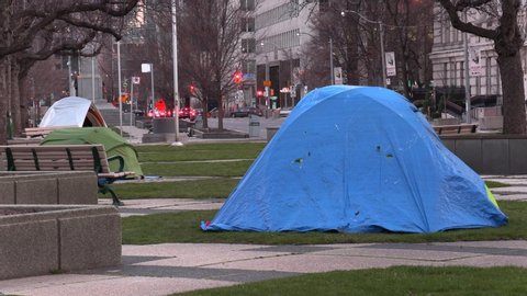 Toronto, Ontario, Canada April 2020 Homeless people sleep in tents on street during COVID 19 coronavirus pandemic in Toronto
