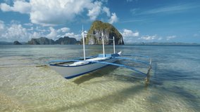 Tourist banca boat float in morning light ready for island hopping trip. Nature scene of El Nido area, Palawan, Philippines