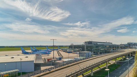 Hannover, Germany - April 10, 2020: Coronavirus (COVID-19), Stored and Parked Aircraft of TUI Fly in headquartered at Hannover Airport. Timelapse. 4K