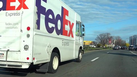 
FedEx mail packages delivery truck, highway view, Revere Massachusetts USA, April 8, 2020