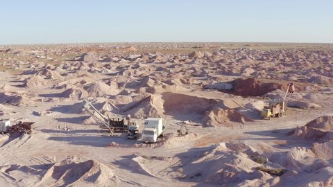 Surreal Outback Australian Opal Fields of Coober Pedy. Vast Mars Like landscape of diggings and mine shafts. Some showing aged machinery from yesteryear.