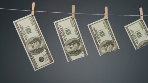 Video of dollar devaluation on clothesline rope