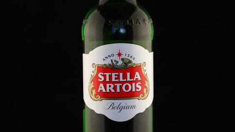 LVIV, UKRAINE - April 10, 2020: Stella artois bottle of beer black background