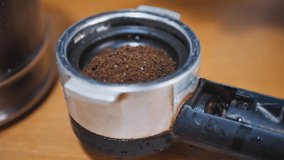 The process of making coffee, picking up coffee, tamping coffee footage video 4k.