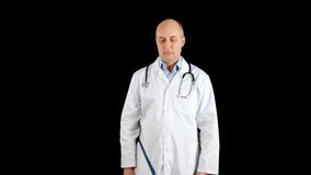 Portrait male doctor in medical gown and clip board on black background. Practitioner in white coat with stethoscope holding clipboard on black background