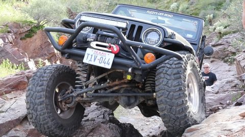 Florence, Arizona,USA,March,16,2020.: Black Rubicon Jeep Wrangler rock crawling on the Elvis Jeep trail in Florence Arizona.