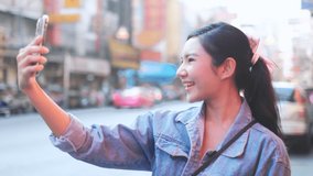 Traveler Asian blogger women travel in Bangkok, Thailand, beautiful female using mobile phone make vlog and live in social media .woman tourist making video call.Travel in China town .