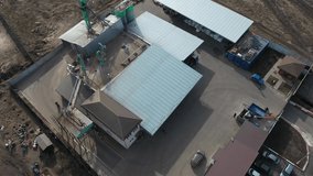 Small animal feed manufacturing plant, aerial view 4k footage