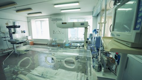 Labour ward with an empty incubator for babies