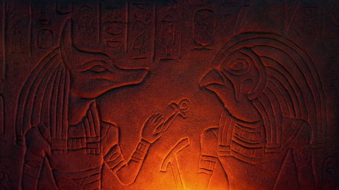 Egyptian Carvings Lit Up With Fire In Dusty Tomb
