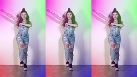 Funny girl dancing. Funny pose. The party is in full swing. Happy carnival. The teenager moves funny. Vertical video for smartphone and phone. Infinity animation. 