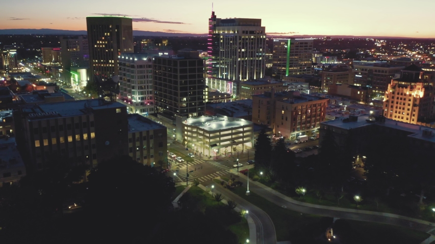 Aerial flying over downtown Boise at night. Boise, Idaho, USA. 
