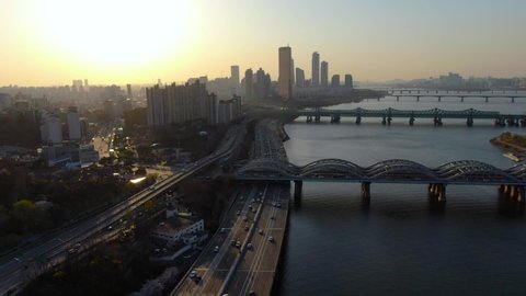 Traffic flow drone in Seoul, Korea, Yeouido Financial Building, Han River Railway Bridge, and Olympic Boulevard, April 5, 2020 at 6pm
