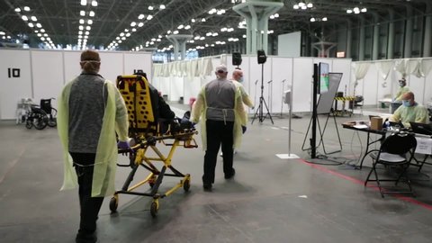 CIRCA 2020 - New York coronavirus Covid-19 patients are treated at the Javits Convention Center during the pandemic epidemic outbreak.