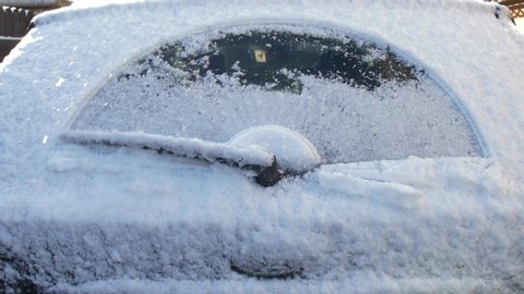 Rear Wiper Removes Snow from Rear Car Window