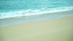 Small wave, Soft wave on sand beach for opening video, text space. white sand beach, Ocean Wave On Sandy Beach