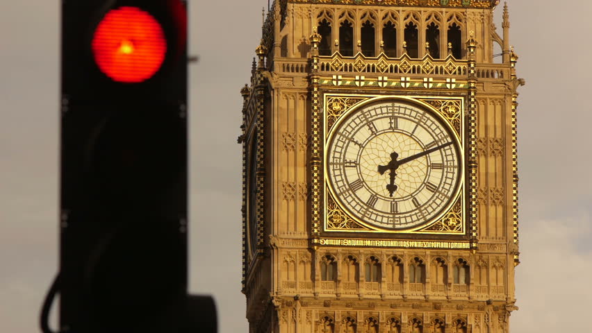 London big Ben clock face with traffic lights