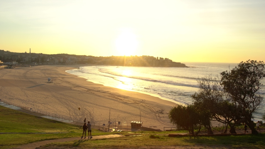 COVID-19 Sydney beaches closed due to lockdown and social distancing. Sydney's iconic beach is normally packed with people exercising and swimming.  Royalty-Free Stock Footage #1050529660