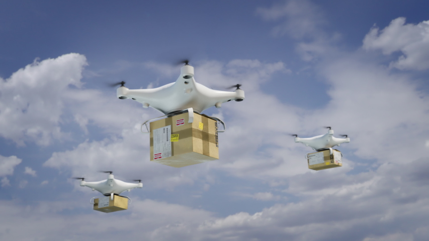 Drones deliver packages. Close up of multiple UAV aerial drones flying on blue sky carrying packages with food, medicine and clothes. Royalty-Free Stock Footage #1050533635