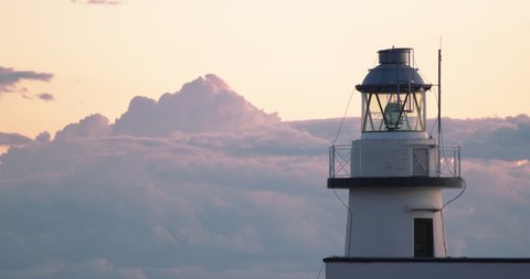 Beautiful lighthouse ina Bacoli bay on sunset, Gulf of Naples
