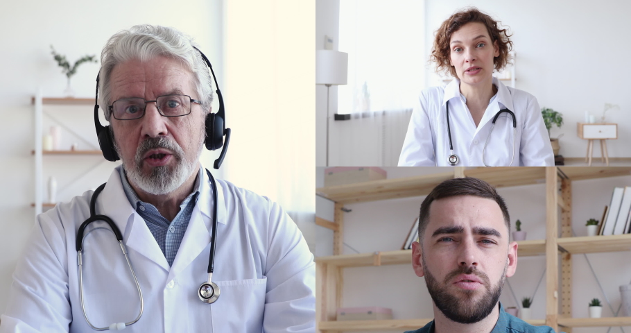 Senior male doctor wearing headset videoconferencing training therapist and surgeon about corona virus pandemic during group conference video call, virtual webcam chat app. Elearning. Screen view. Royalty-Free Stock Footage #1050559567